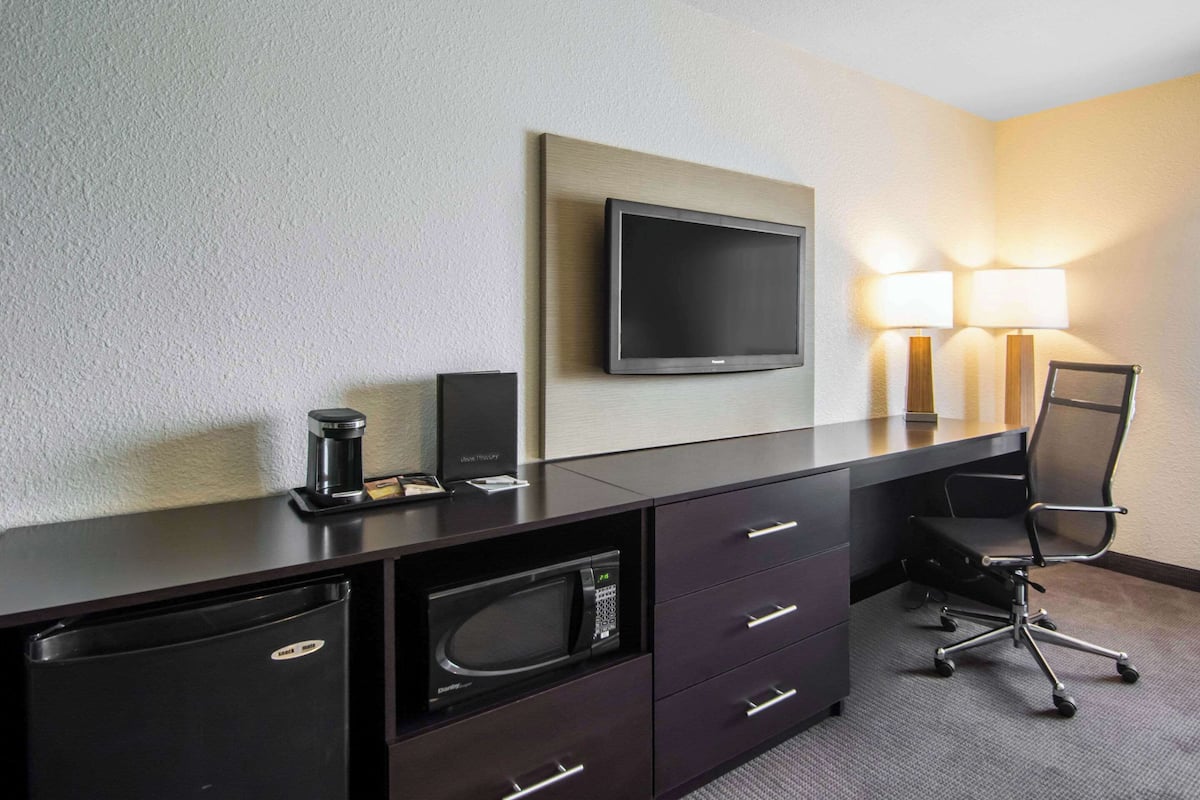 pillow-top beds, desk, blackout curtains, iron/ironing board