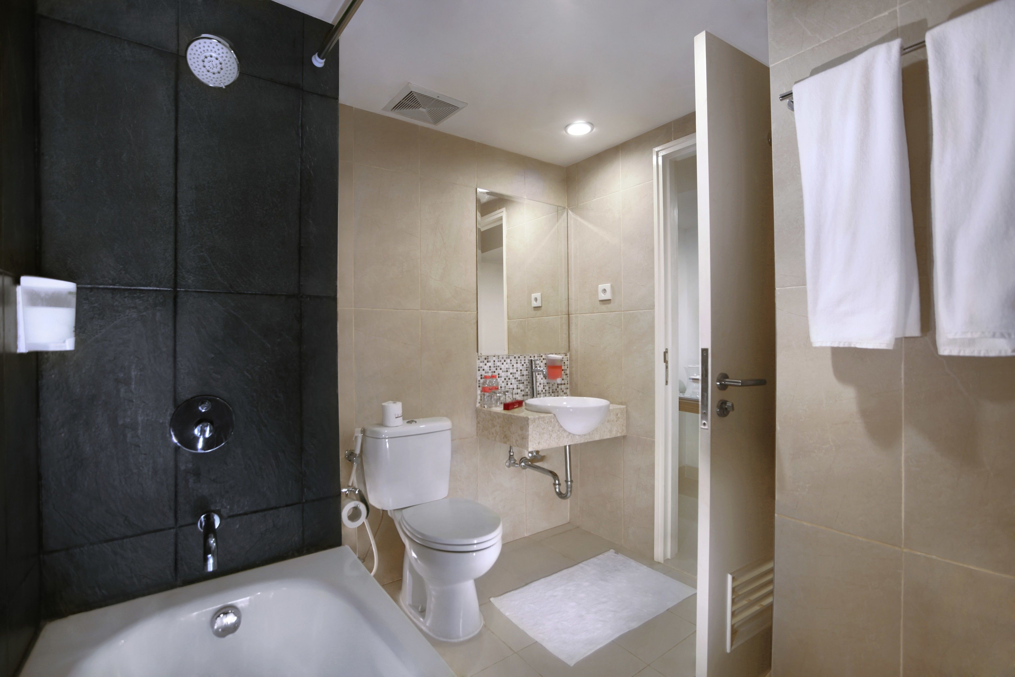premier room | bathroom | shower, rainfall showerhead, free toiletries, towels
