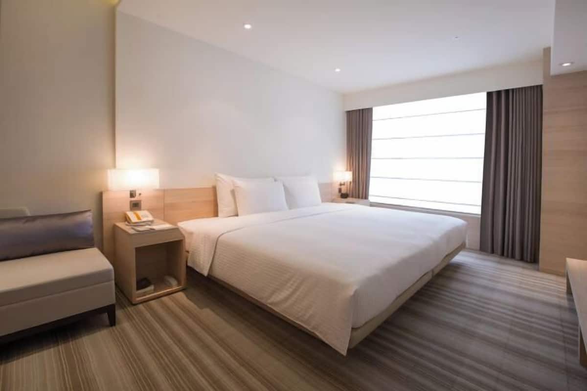 Premium bedding, down duvets, in-room safe, desk