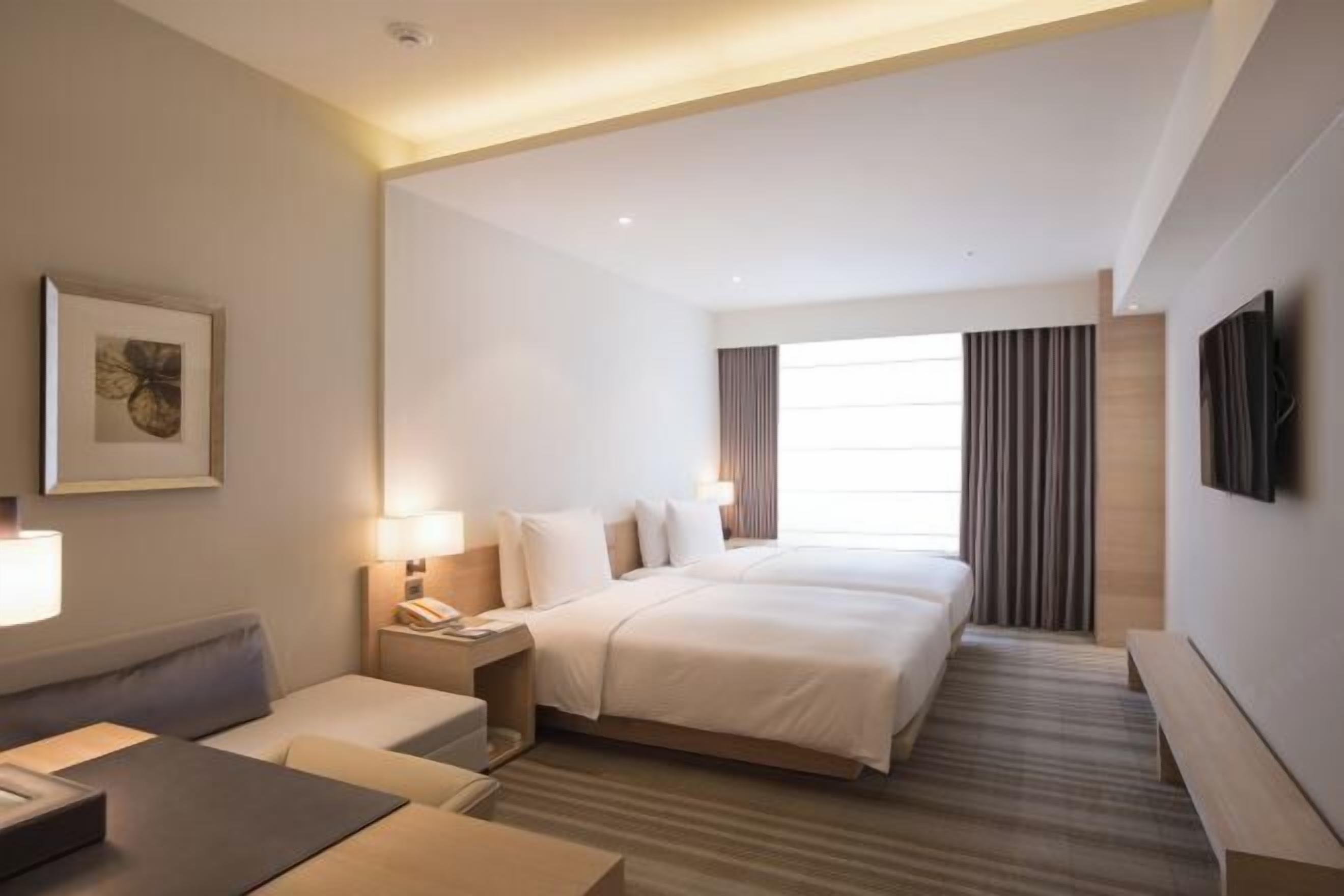 Premium bedding, down duvets, in-room safe, desk