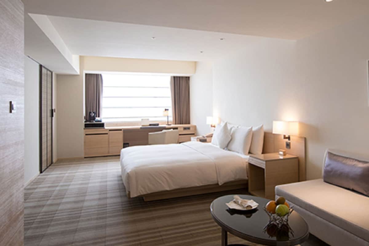Premium bedding, down duvets, in-room safe, desk