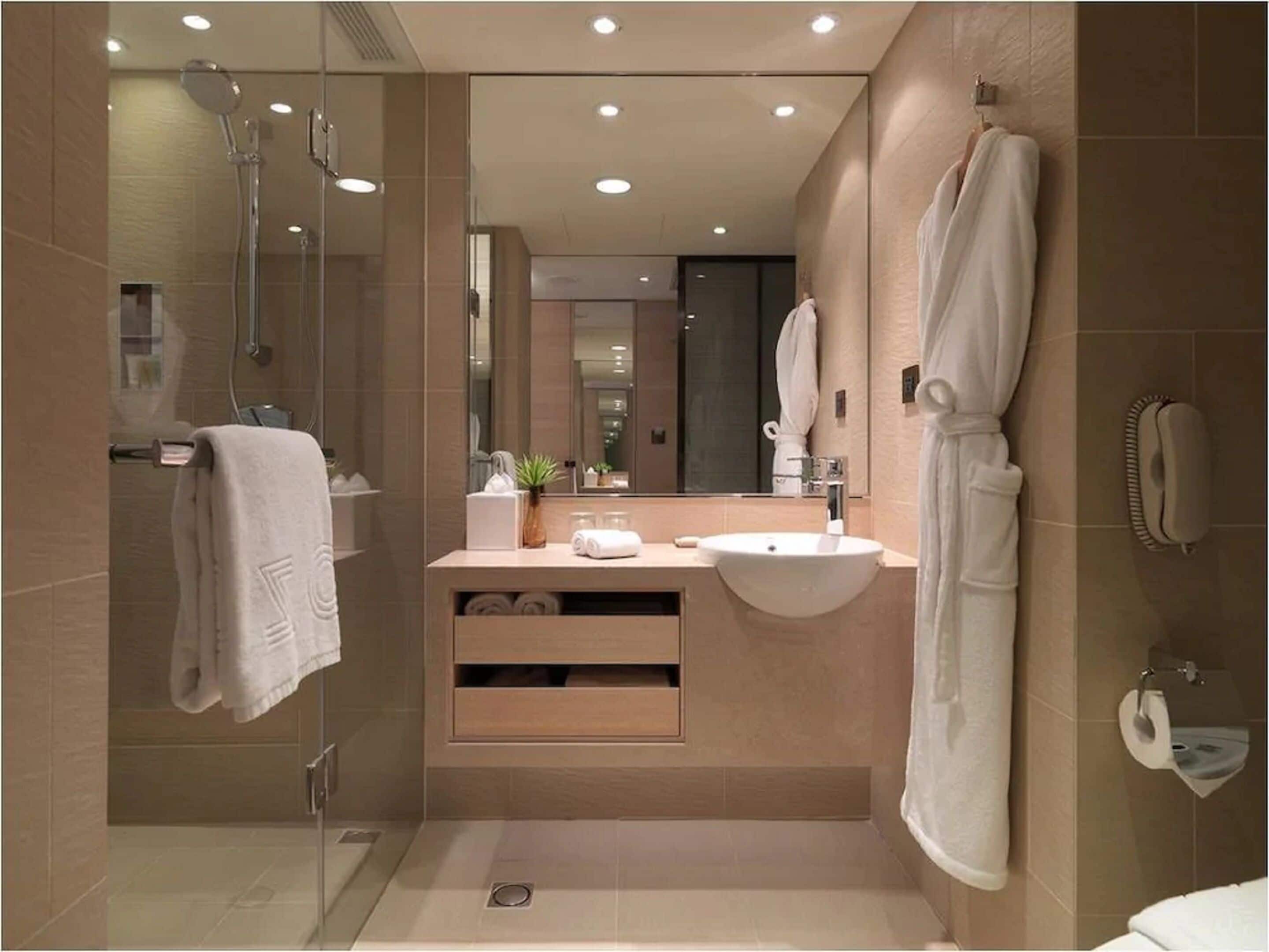 eco-friendly toiletries, hair dryer, slippers, towels