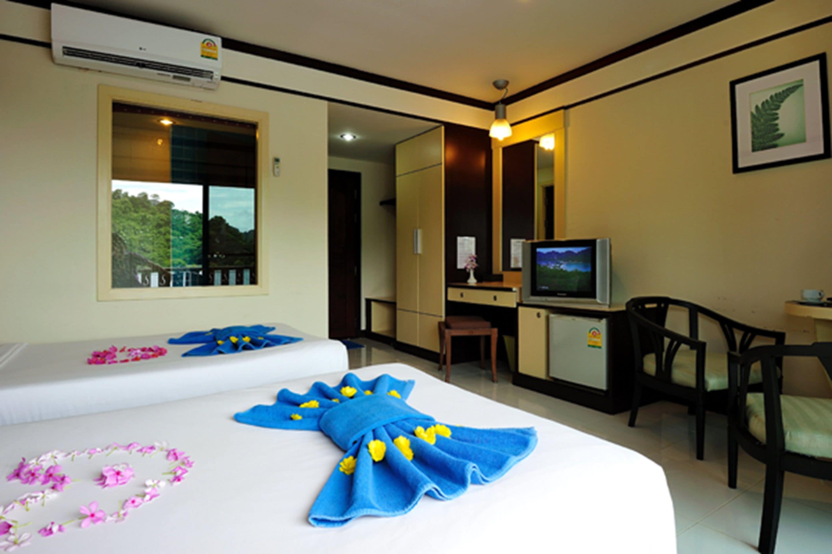 高級客房 | 迷你吧、客房內保險箱、免費無線上網、床單