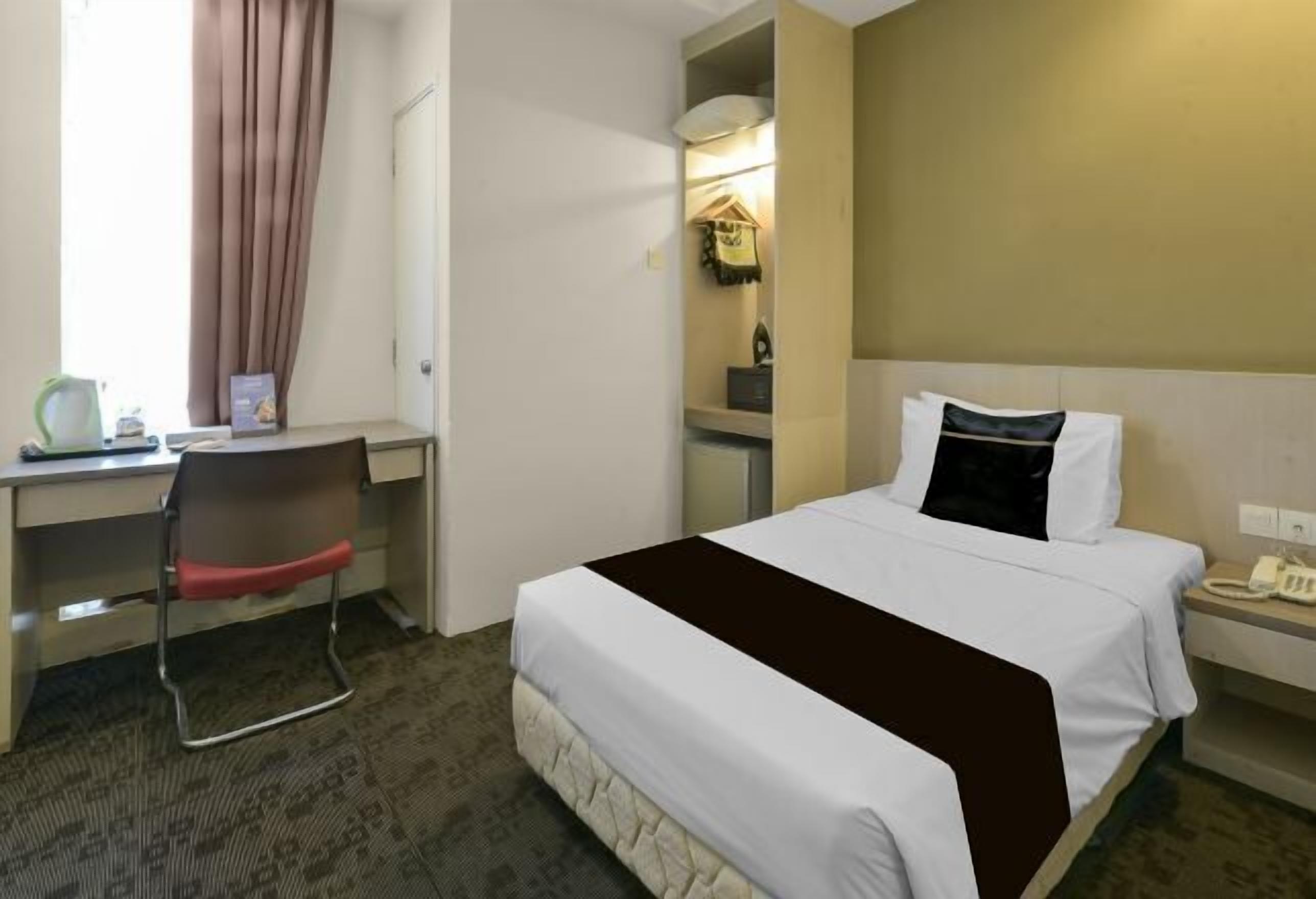 Peralatan tempat tidur premium, Wi-fi percuma, cadar katil 