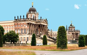 A large historic building with classical architecture, including columns and statues, and a prominent dome. - Hotel am Luisenplatz (Potsdam)