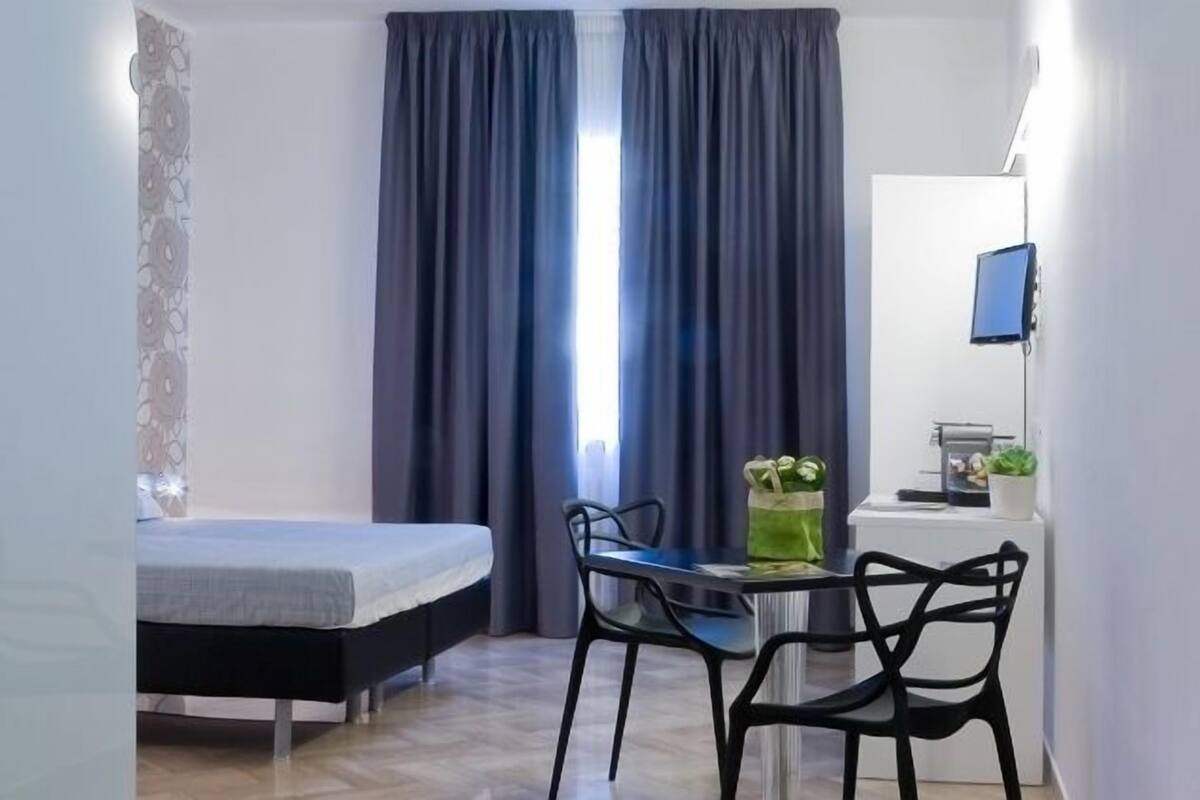 Soundproofing, iron/ironing board, WiFi (free), bed sheets