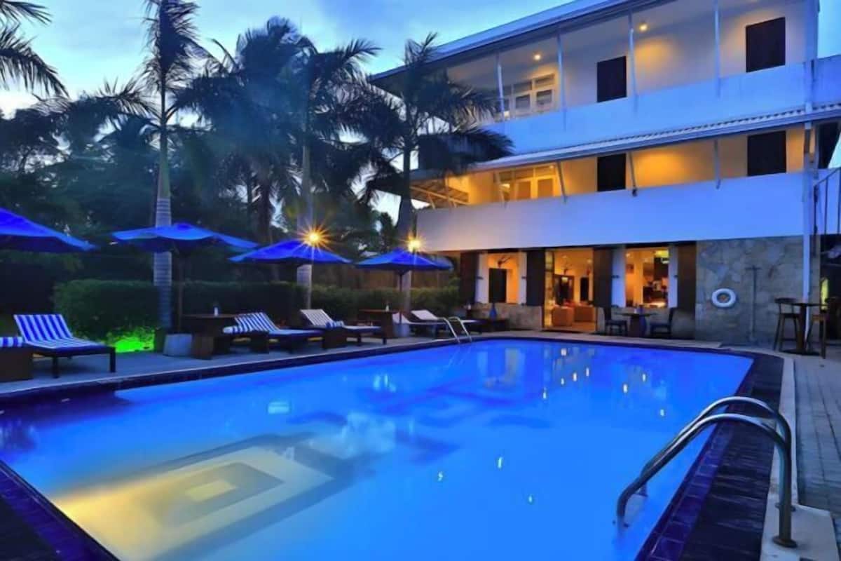 Outdoor pool, pool umbrellas, pool loungers
