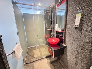 Shower, free toiletries, hair dryer, slippers