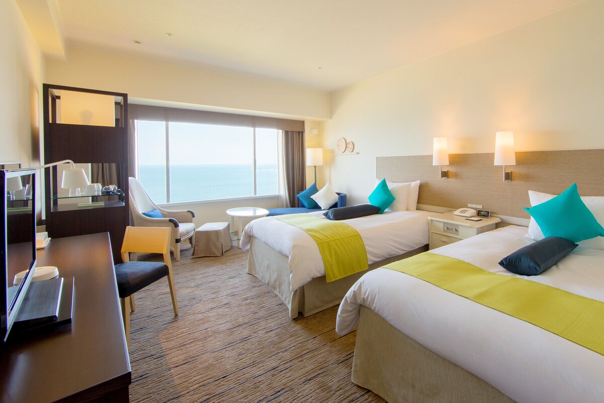 Standard Room, 2 Twin Beds, Ocean View | In-room safe, desk, laptop workspace, blackout drapes