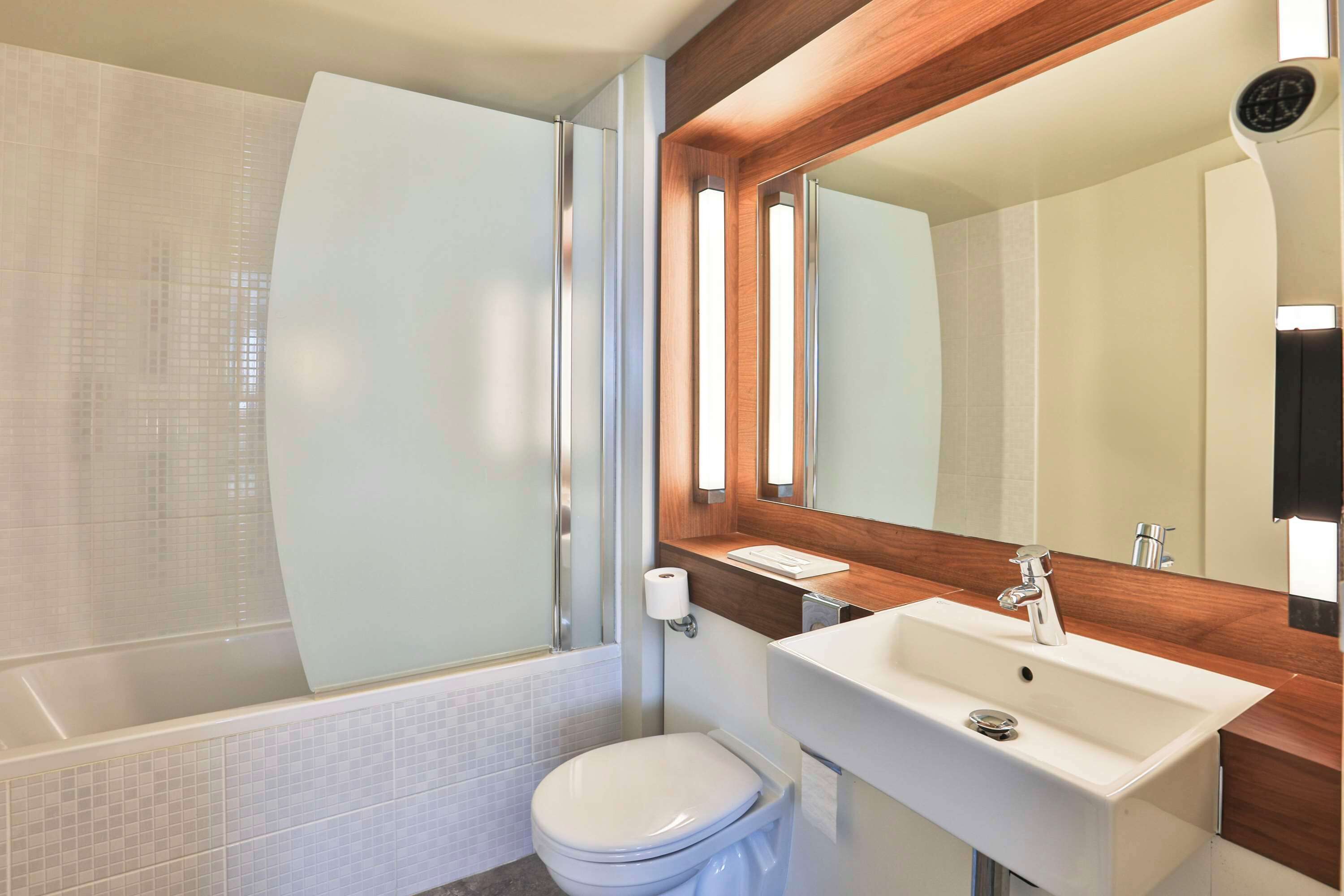 eco-friendly toiletries, hair dryer, towels