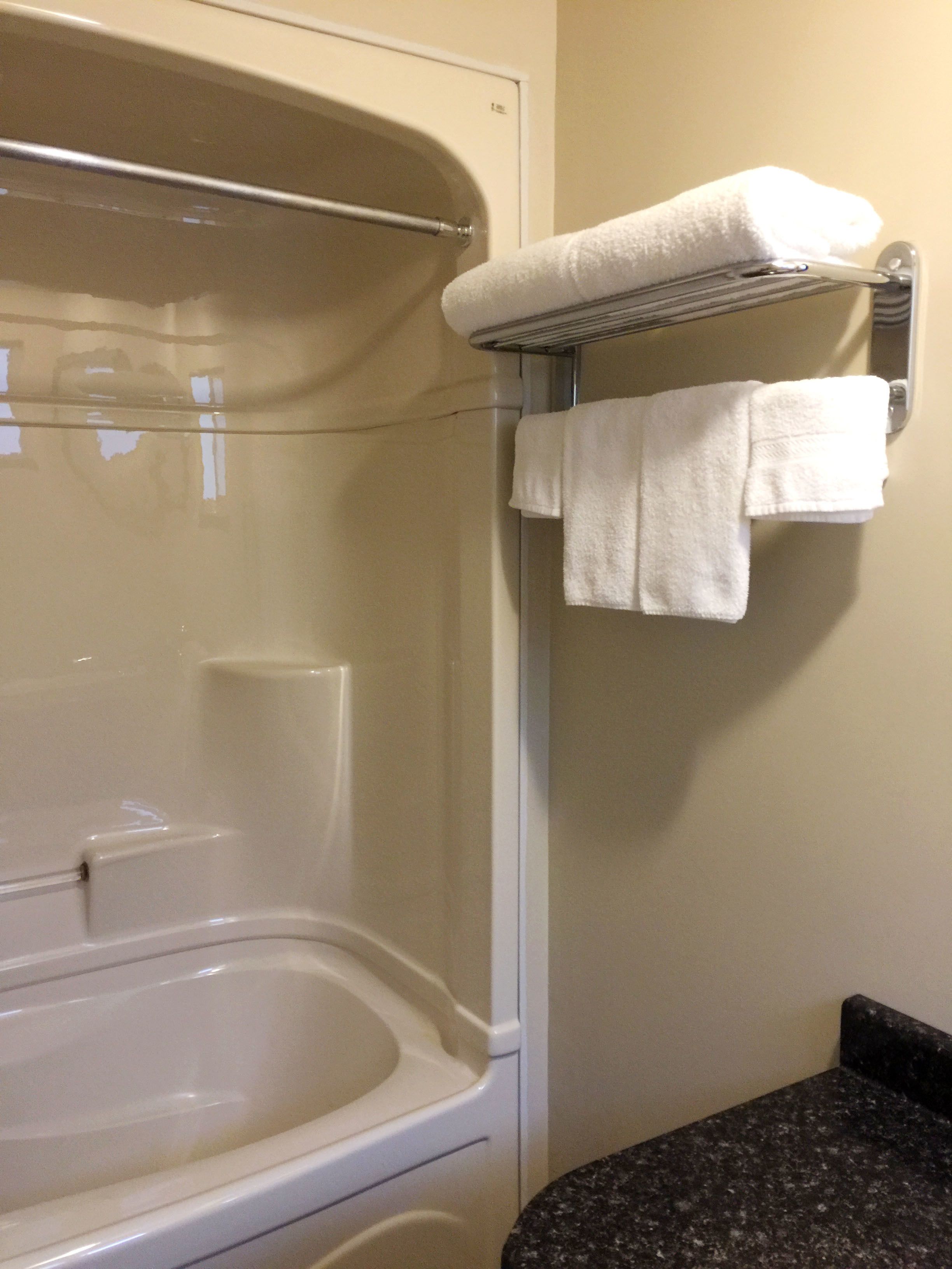 Deluxe Room, 1 King Bed | Bathroom | Hair dryer, towels