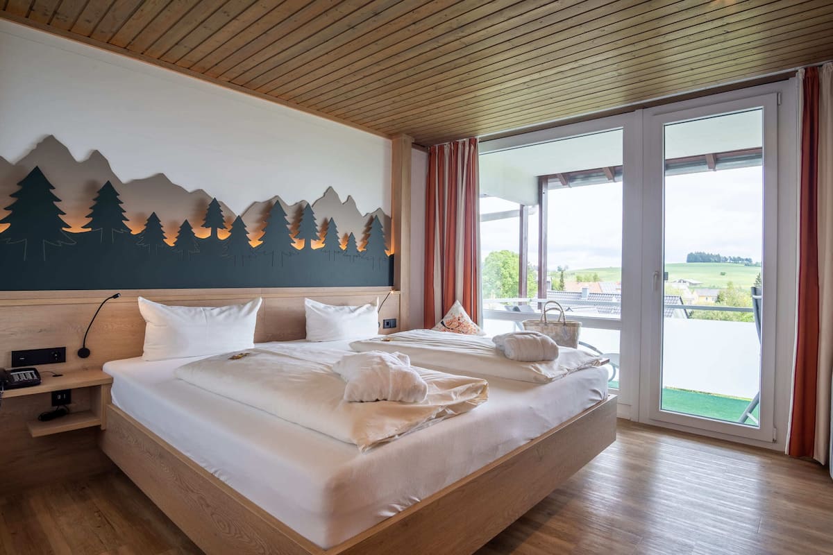 Quarto conforto (A) | Roupas de cama antialérgicas, cofres nos quartos