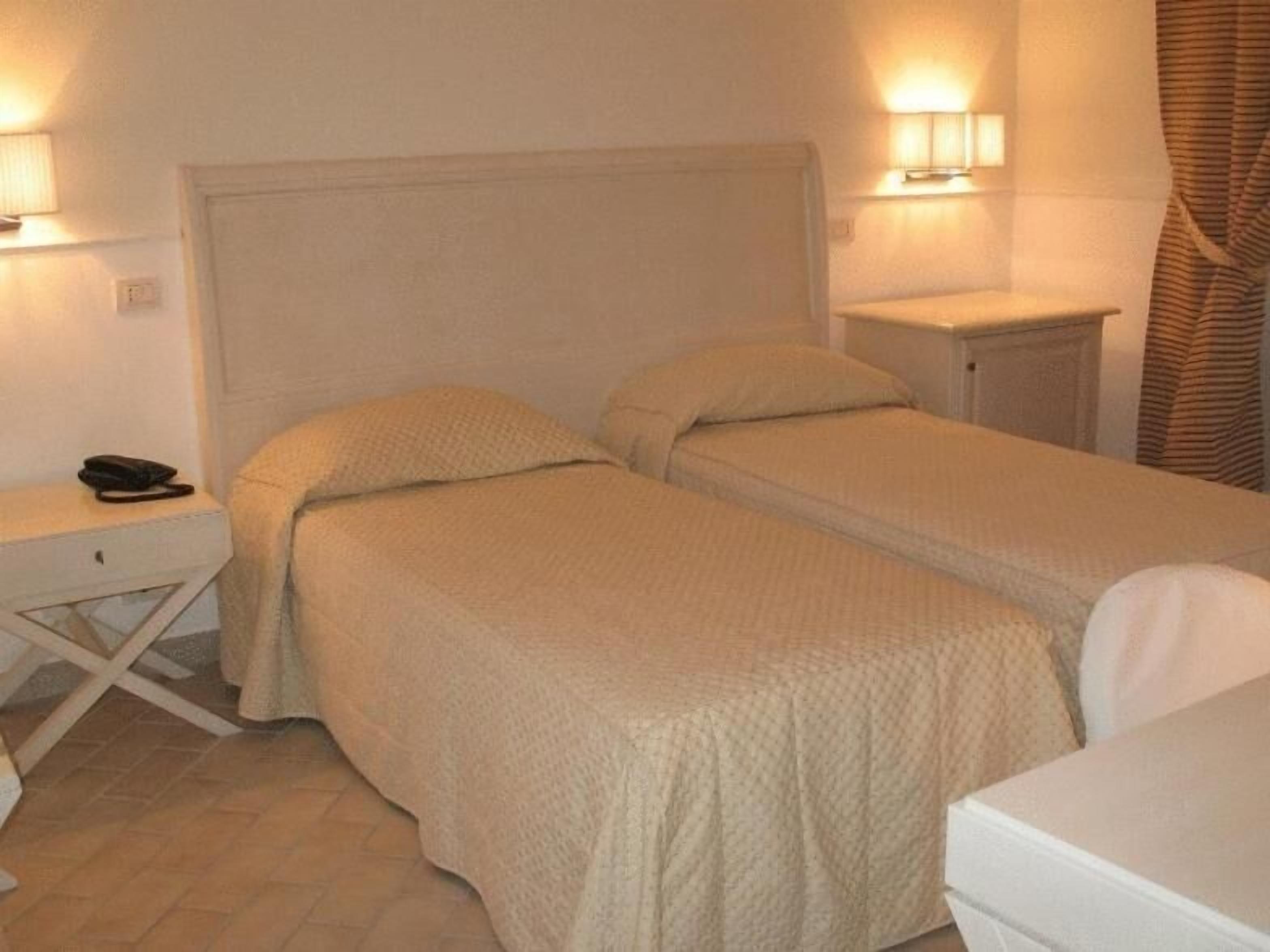 premium bedding, free minibar items, in-room safe