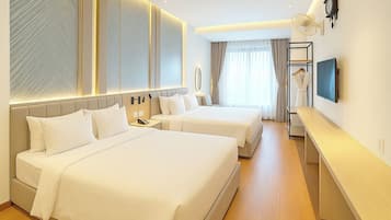 Family Suite Room | Minibar, in-room safe, iron/ironing board, free WiFi