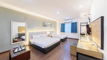 Grand Room, Air conditioning, City View | Minibar, in-room safe, iron/ironing board, free WiFi