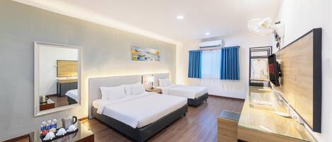 Grand Room, Air conditioning, City View | Minibar, in-room safe, iron/ironing board, free WiFi