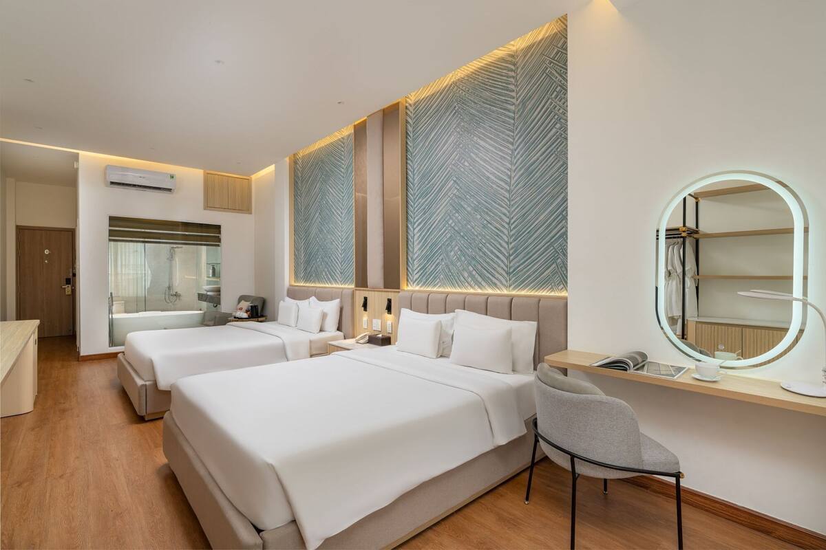 Family Suite Room | Minibar, in-room safe, iron/ironing board, travel cot