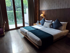 Family Suite, 2 Bedrooms, Balcony, Garden View | Premium bedding, minibar, in-room safe, desk - Oodles Hotel Chhattarpur South Delhi (New Delhi)