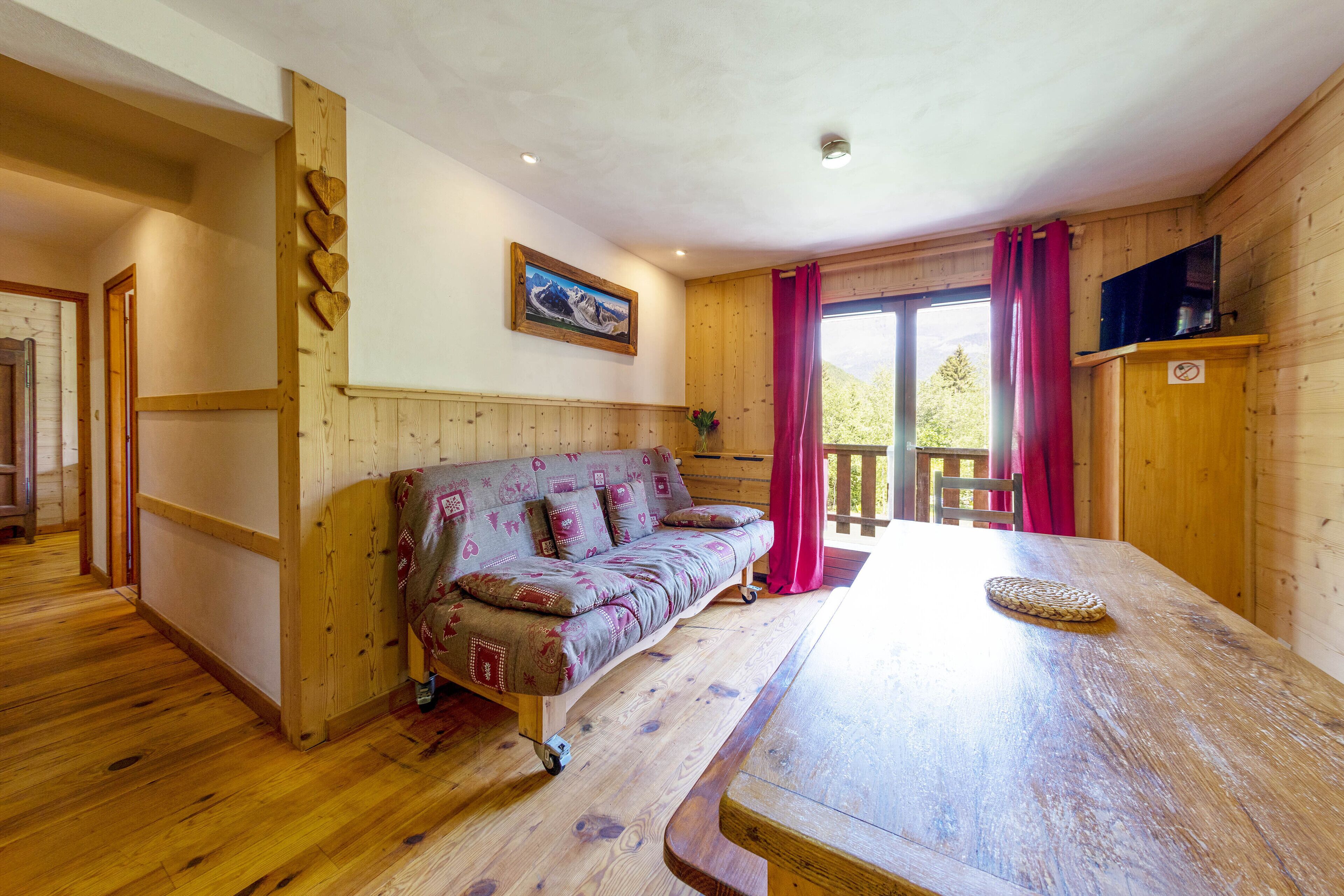 apartment | living area | flat-screen tv, table football, ping pong, books