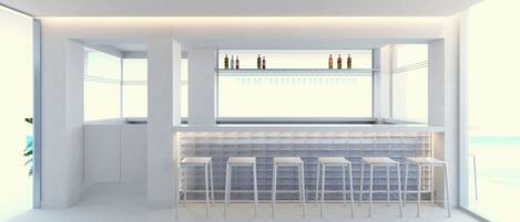 A modern bar area with a high bar counter, multiple stools, and a view of the sea through large windows.