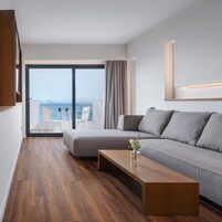 Suite, Sea View | Minibar, in-room safe, blackout drapes, soundproofing