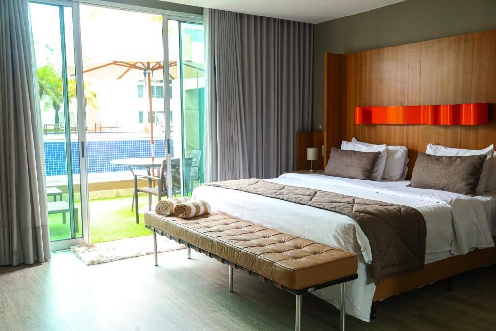 Suite com Cama King Size e Varanda | Frigobar, cofres nos quartos, escrivaninha, Wi-Fi de cortesia