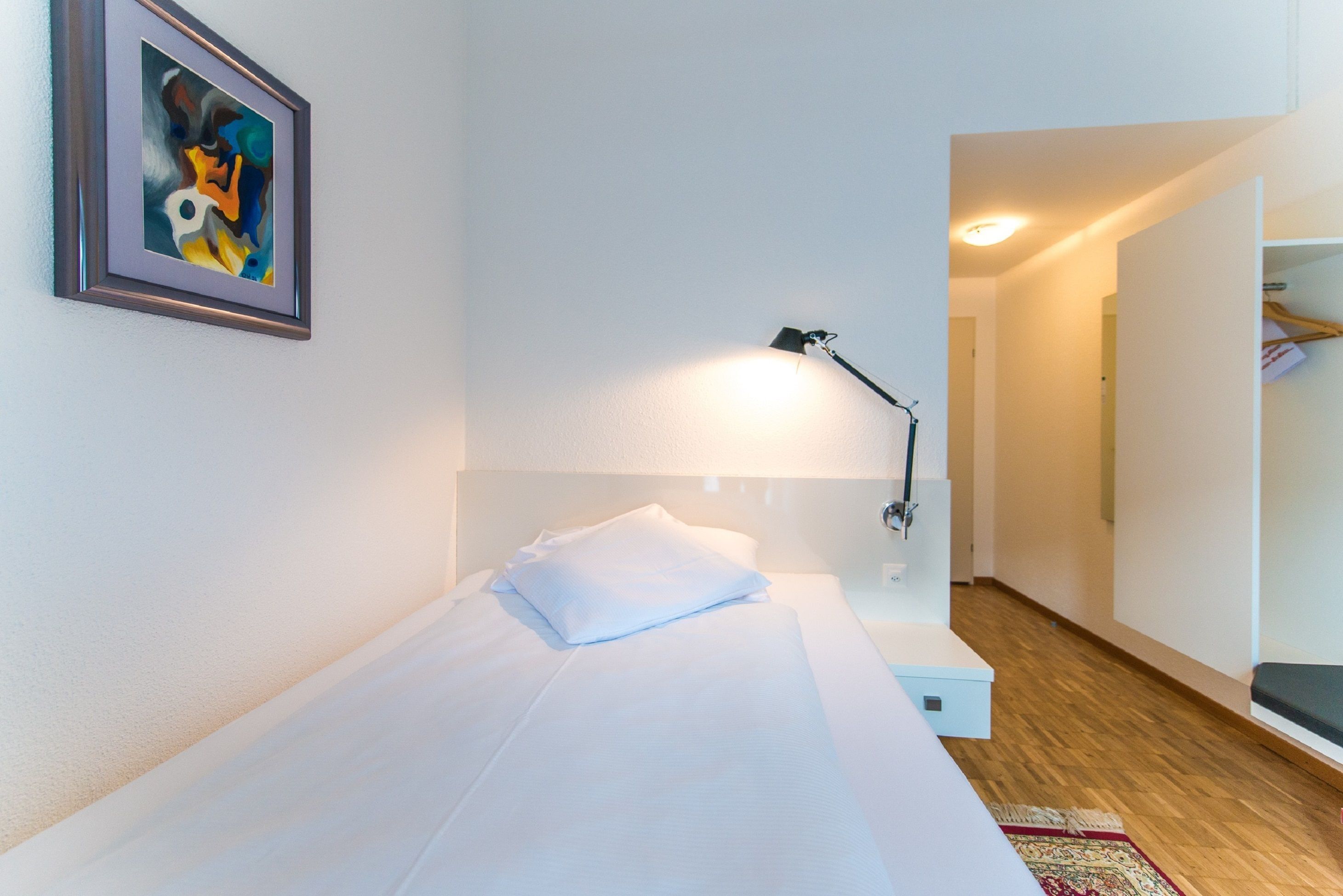 comfort single room | in-room safe, desk, blackout curtains, free wifi