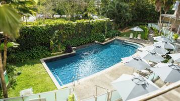 Outdoor pool, open 8:00 AM to 8:00 PM, pool umbrellas, sun loungers