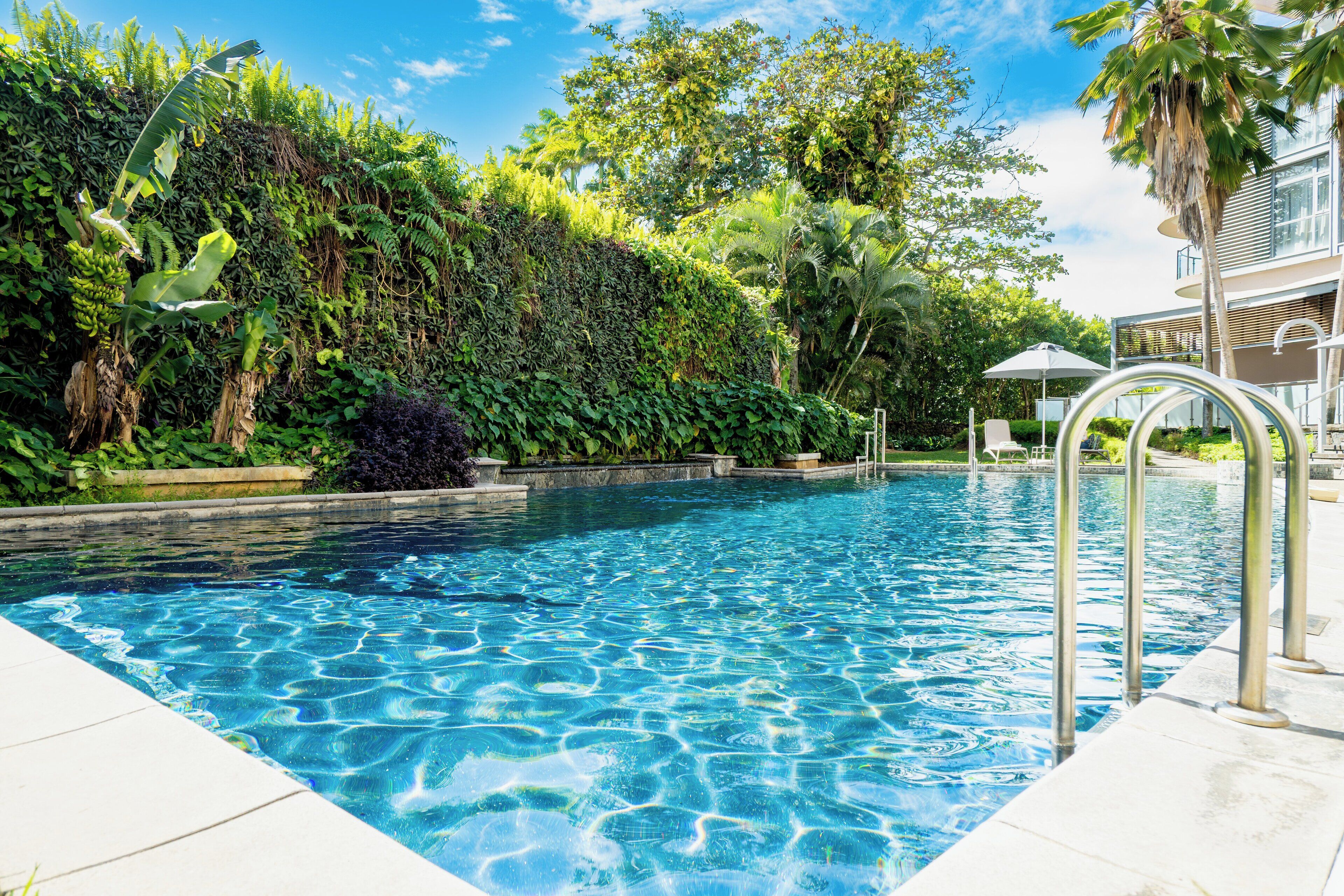 outdoor pool, open 8:00 am to 8:00 pm, pool umbrellas, pool loungers