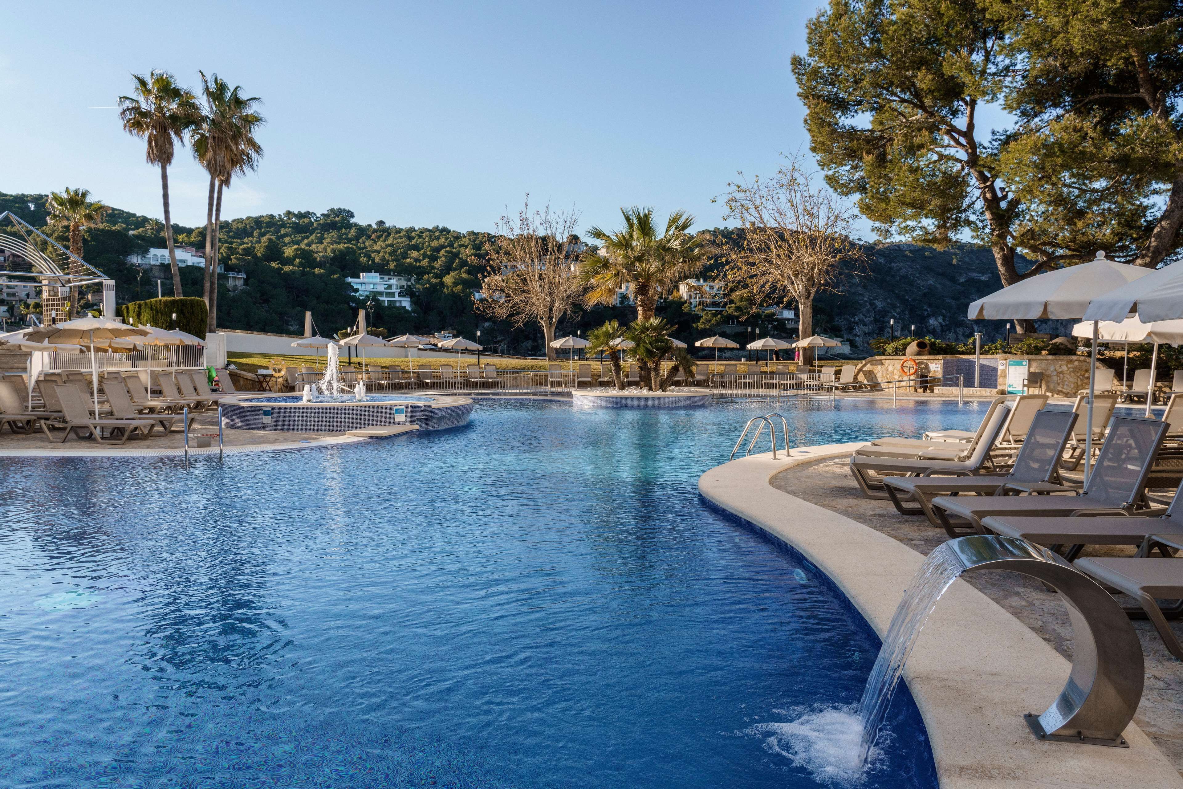 2 indoor pools, seasonal outdoor pool, pool umbrellas, pool loungers