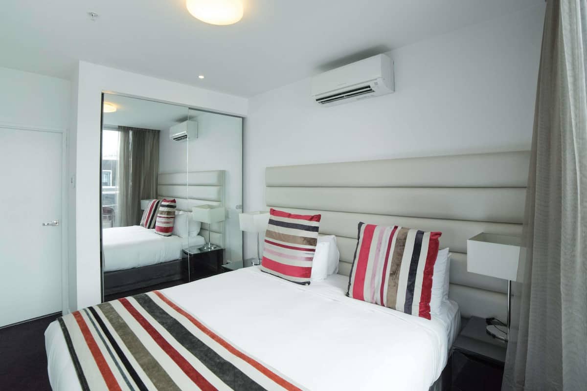 Premium bedding, Tempur-Pedic beds, desk, blackout curtains