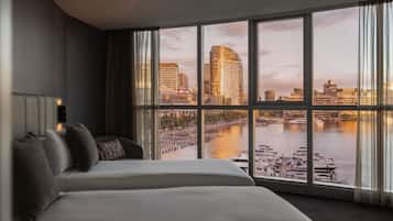 Premium bedding, Tempur-Pedic beds, desk, blackout drapes