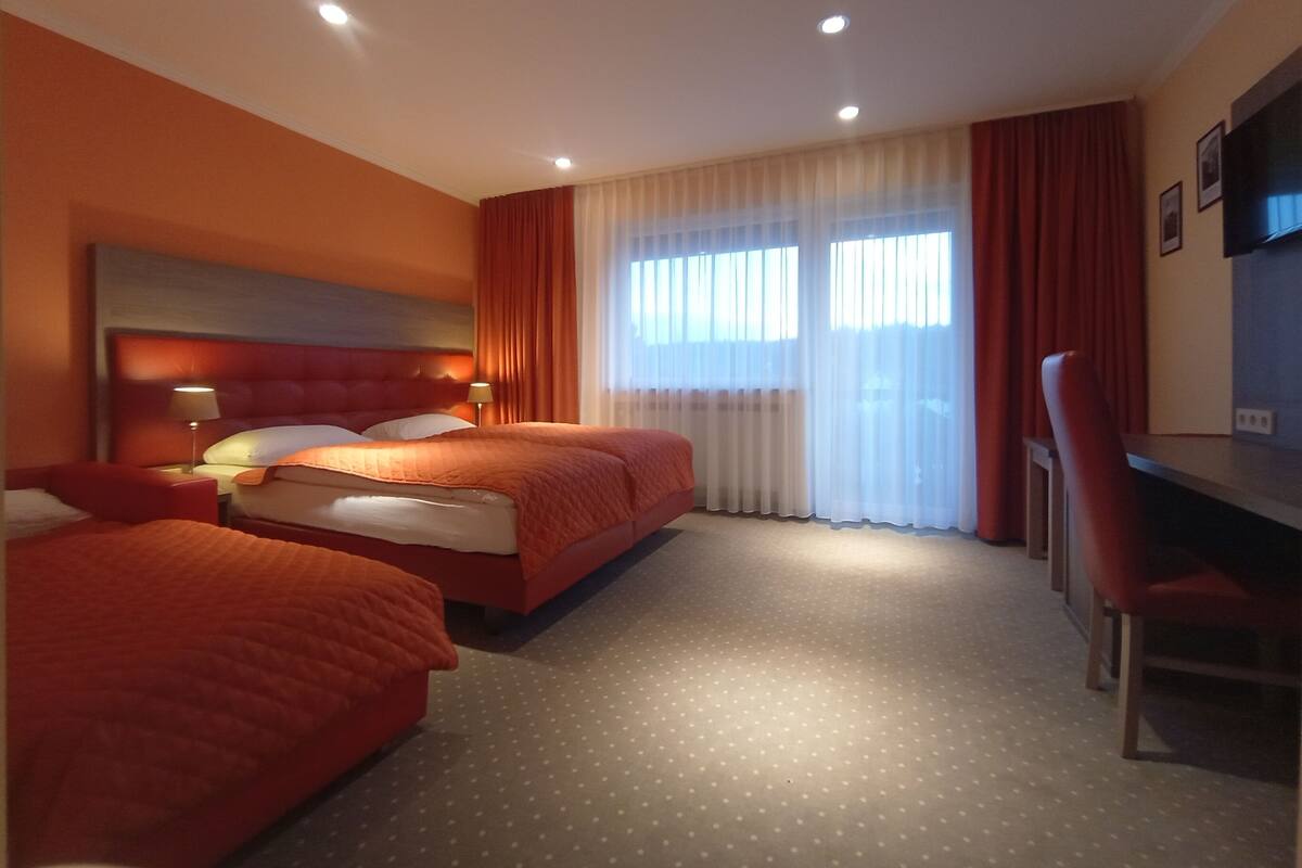 Family Room Modern with Balcony 1 Double bed and 1 Single Bed or 3 Single Beds | Hypo-allergenic bedding available, down comforters, in-room safe