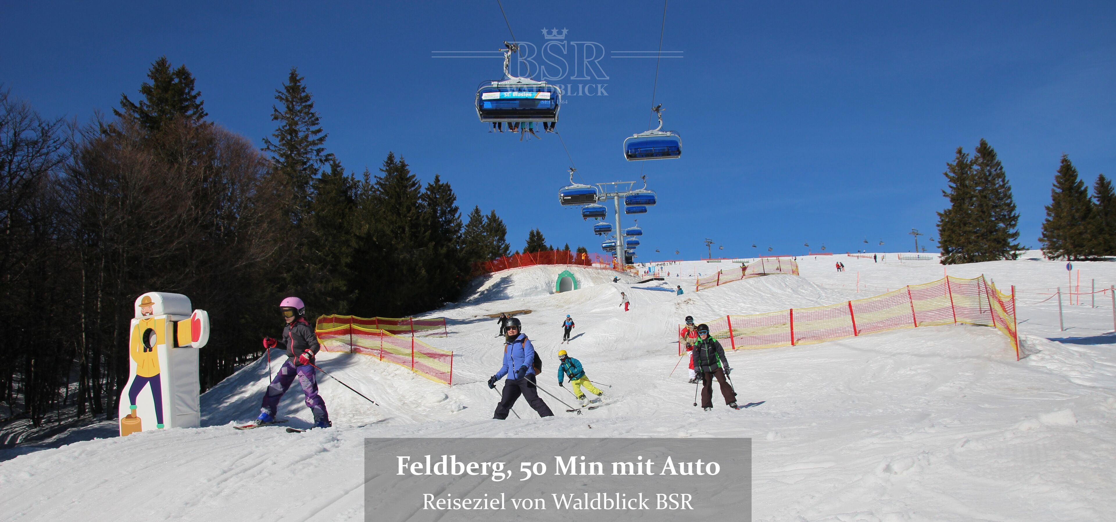 A ski resort with a ski lift, skiers, and a snow-covered landscape.