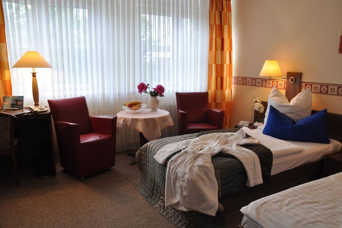 desk, free cots/infant beds, free wifi, bed sheets