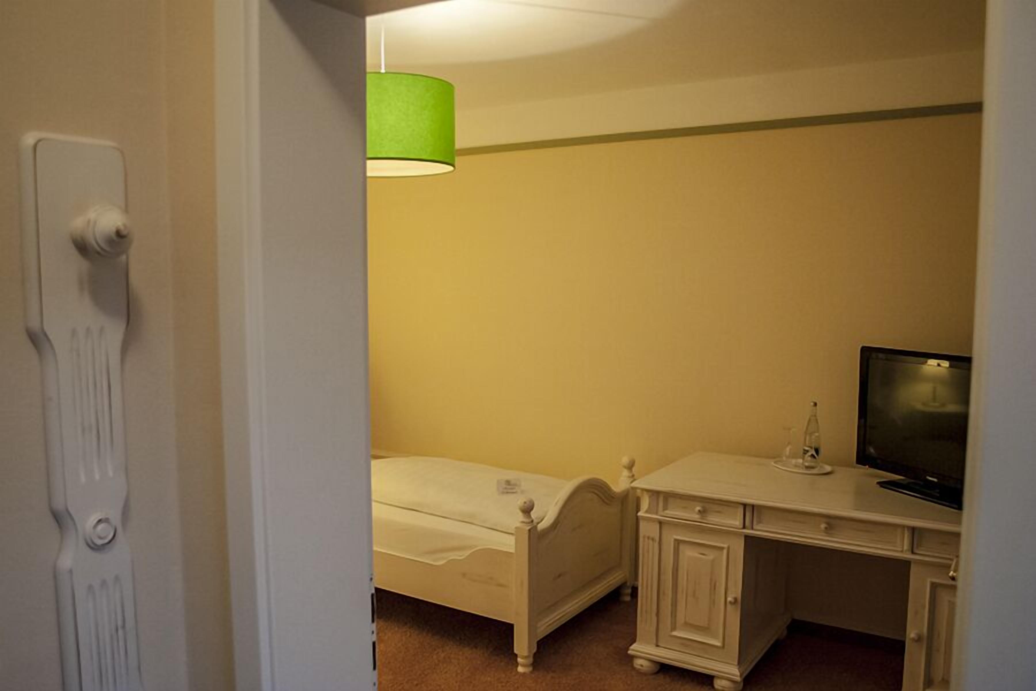 family room | in-room safe, desk, soundproofing, cots/infant beds