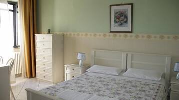 Desk, laptop workspace, blackout curtains, free WiFi