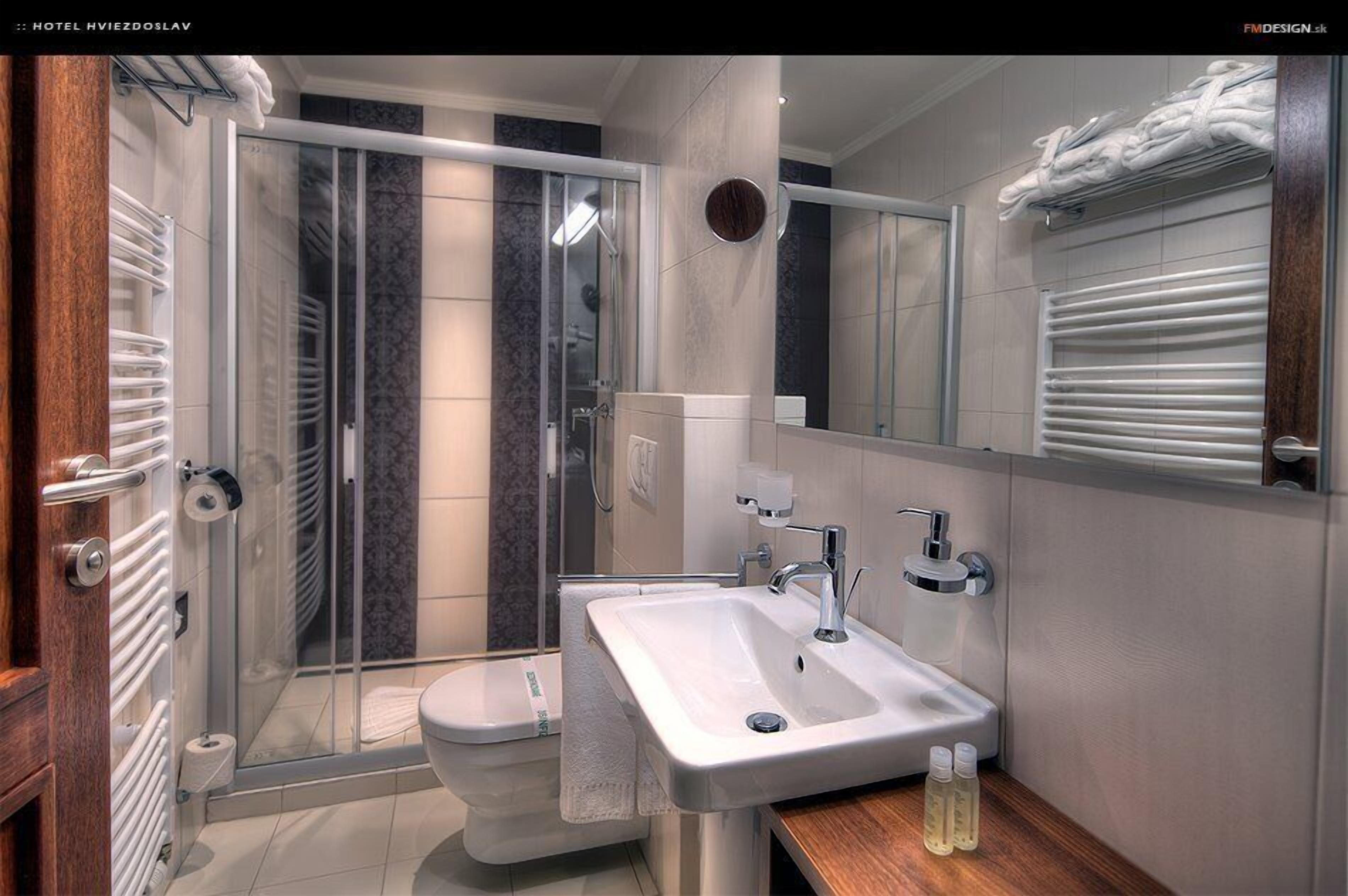 shower, hair dryer, bathrobes, slippers