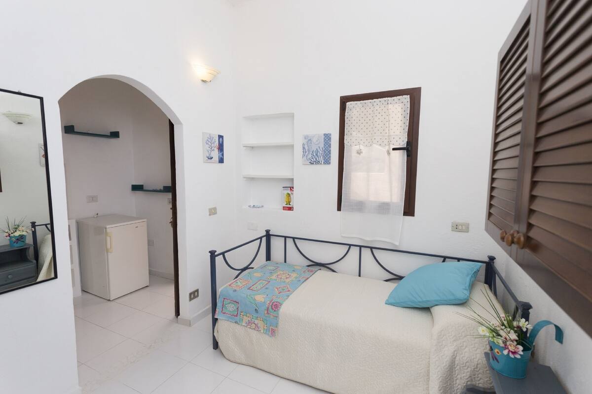 Estúdio, varanda | Cofres nos quartos, ferros/tábuas de passar roupa, berços grátis