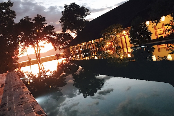Outdoor pool, a natural pool, pool loungers