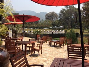 Breakfast, lunch, dinner served; local cuisine, pool views