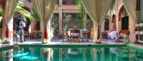 Indoor pool, sun loungers