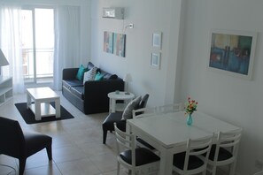 Duplex, 3 Bedrooms, Terrace, City View | Living area | 32-inch TV with cable channels - Laprida Suites (Buenos Aires)