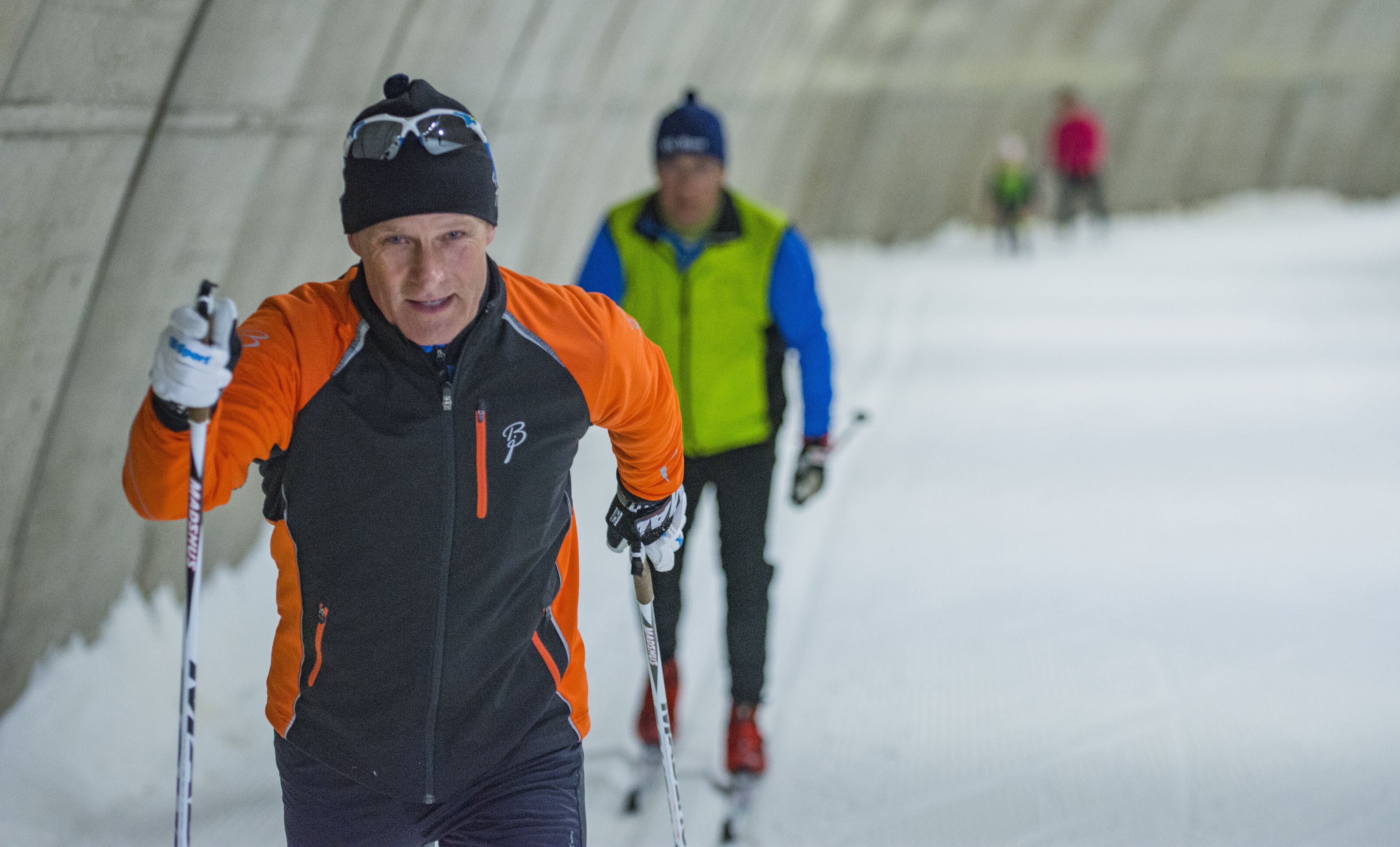 A person skiing in a tunnel.