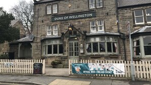 A building named 'Duke of Wellington' with a sign welcoming visitors. - Duke of Wellington (Matlock)