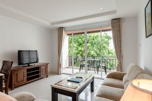 Deluxe 2 Bedroom Apartment | Living area | LCD TV - Jomtien Beach Penthouses (Pattaya)