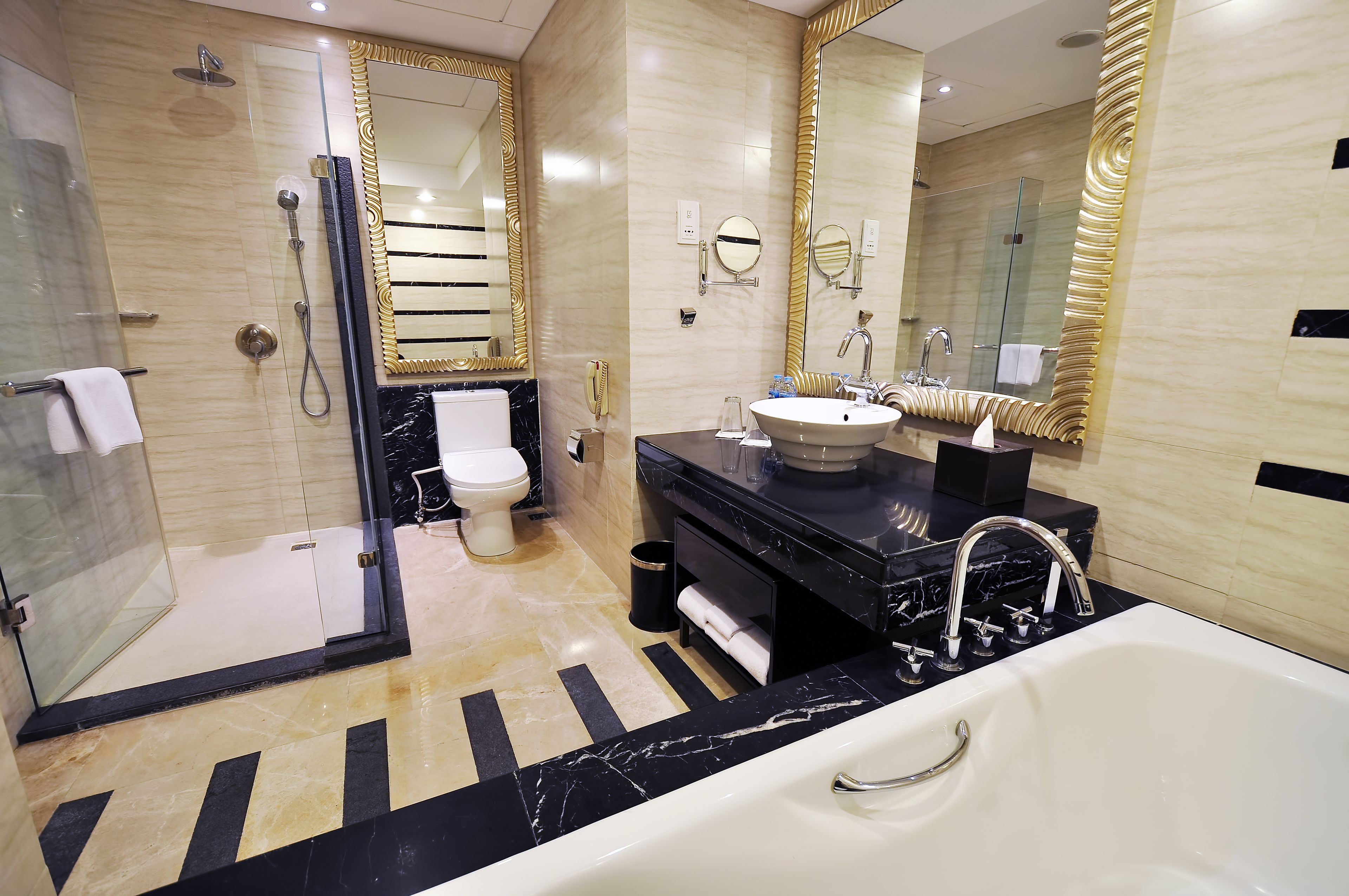 combined shower/bathtub, free toiletries, hair dryer, slippers