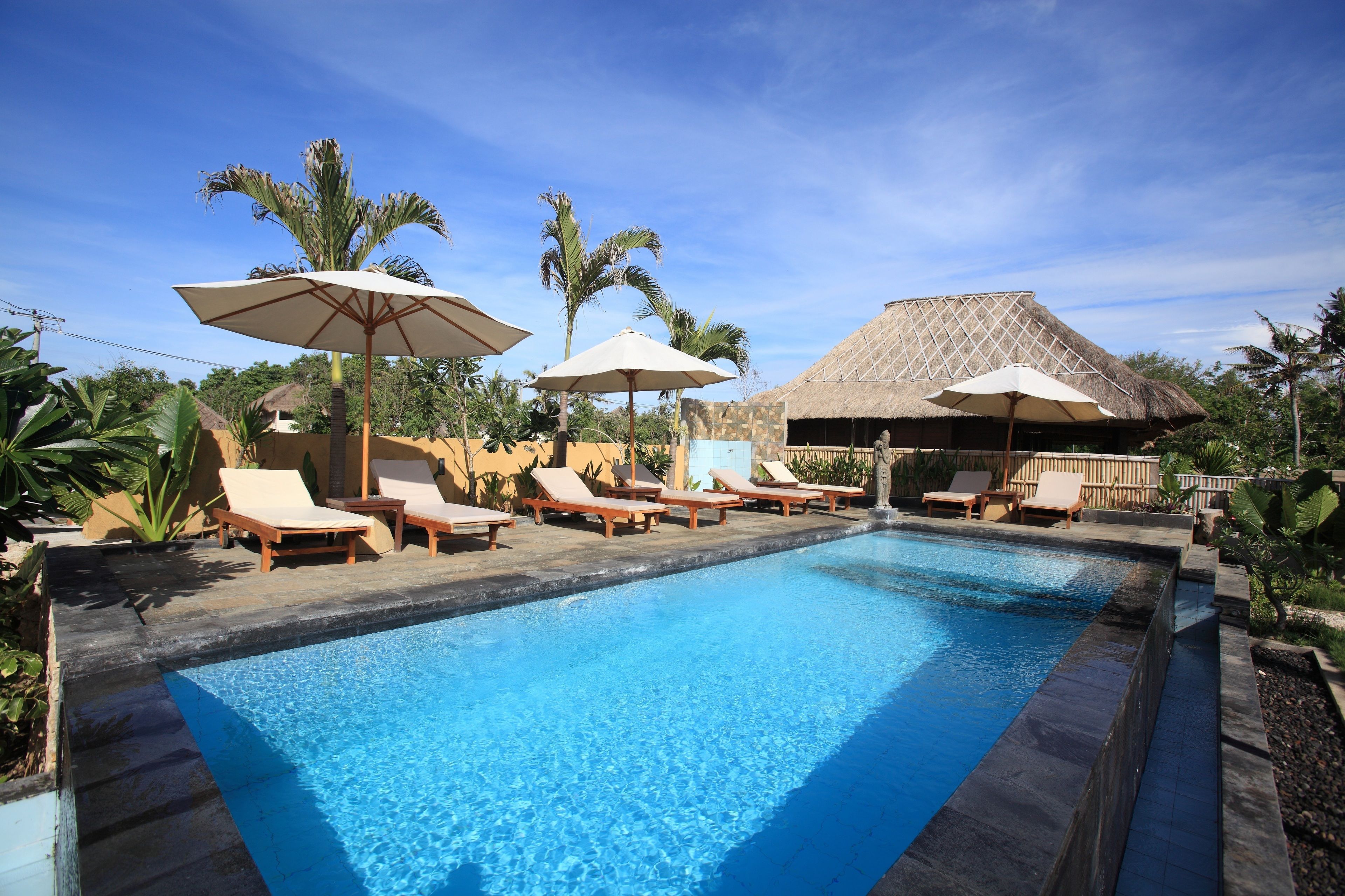 2 outdoor pools, pool umbrellas, sun loungers