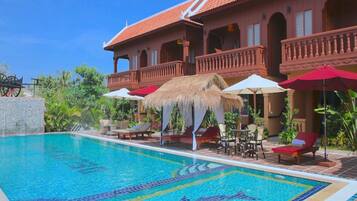 Outdoor pool, pool umbrellas, pool loungers