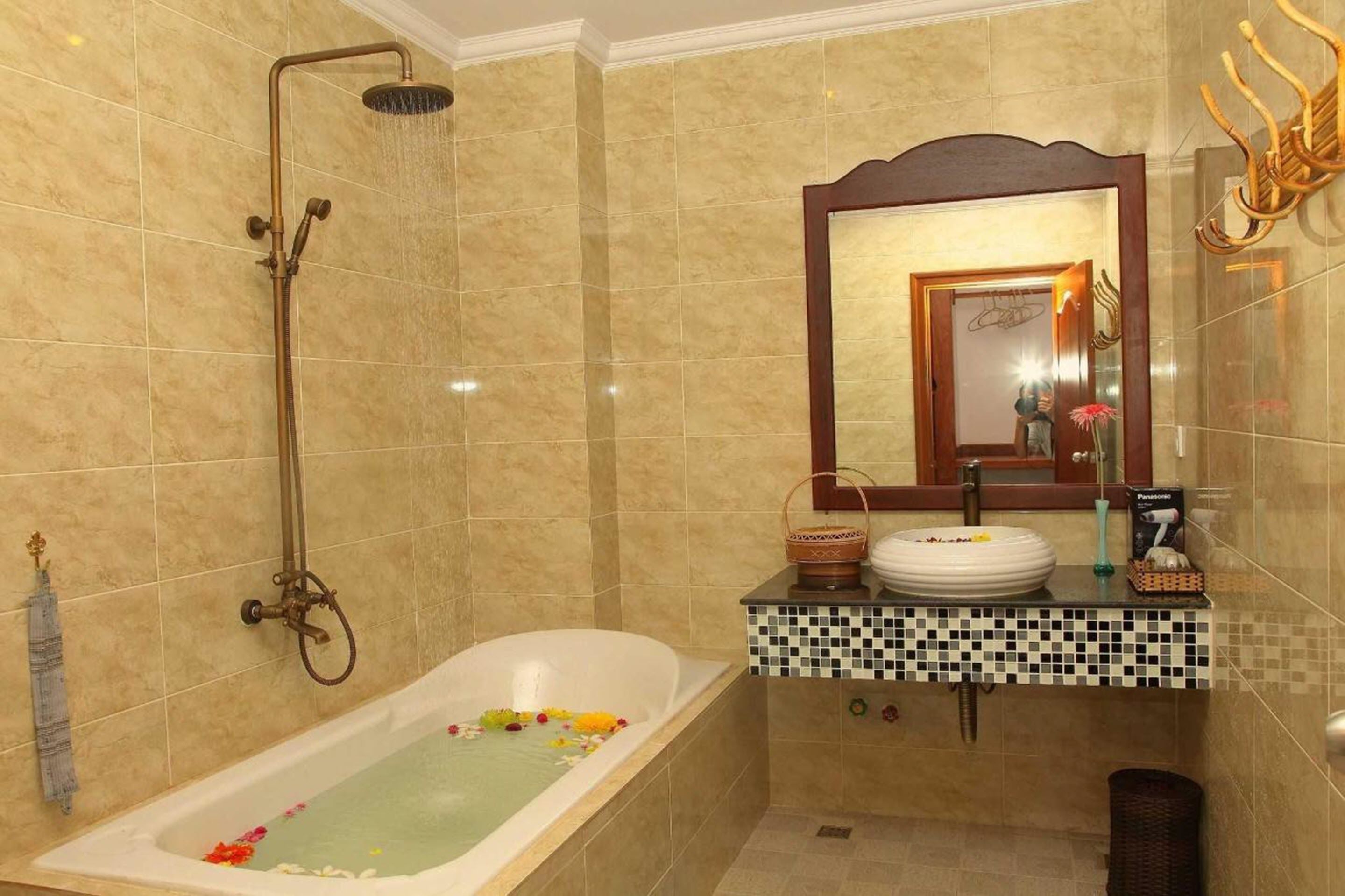 premier double room pool view | bathroom | rainfall showerhead, free toiletries, hair dryer, slippers